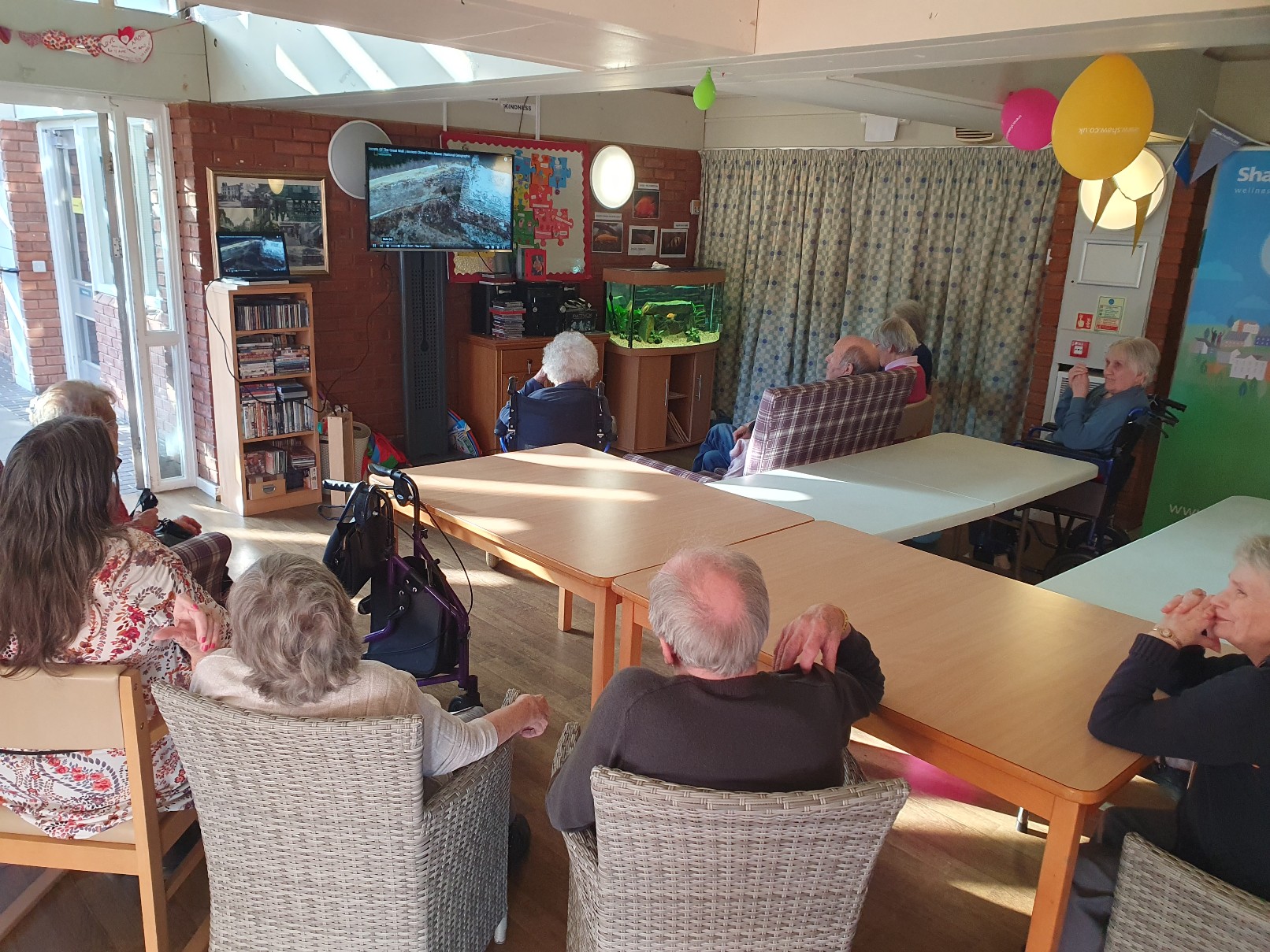 residents watching tv of the Chinese New Year